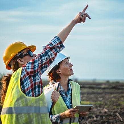 worker-pointing-at-sky